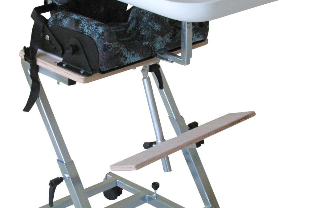 Polohovacia ortéza trupu s odnímateľným stolíkom